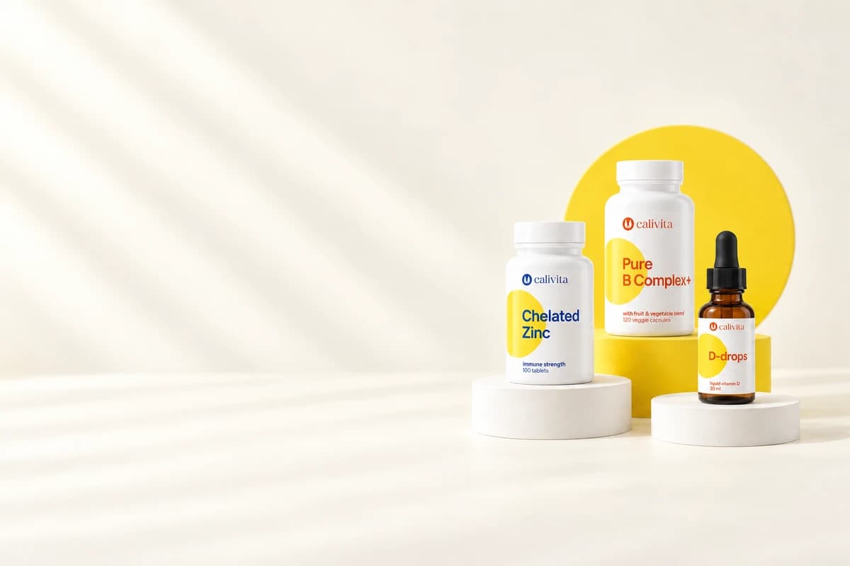 Illustrative arrangement of CaliVita Chelated Zinc, Pure B Complex+ and D-drops packages on white and yellow plinths.